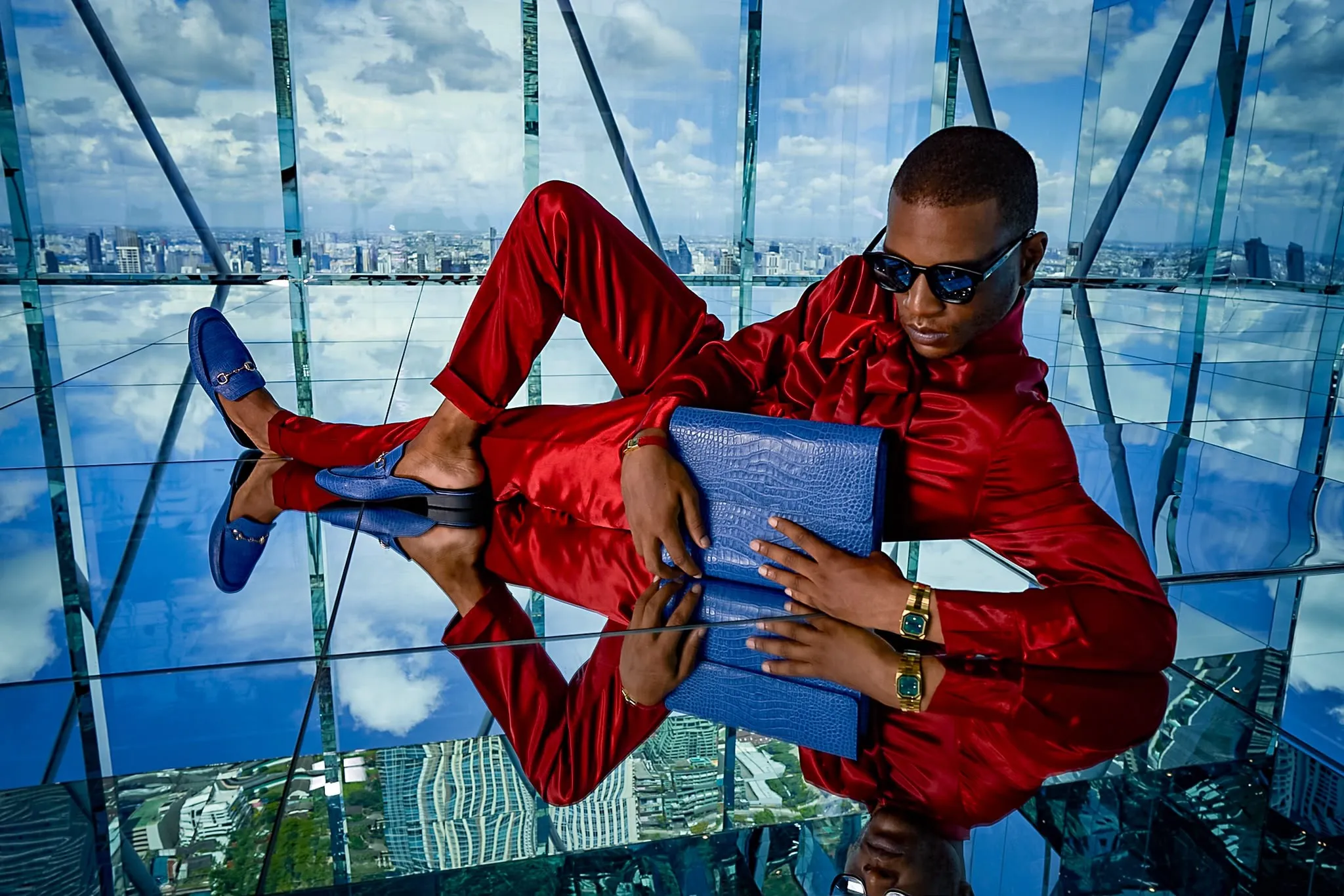 The red suit against the skyline