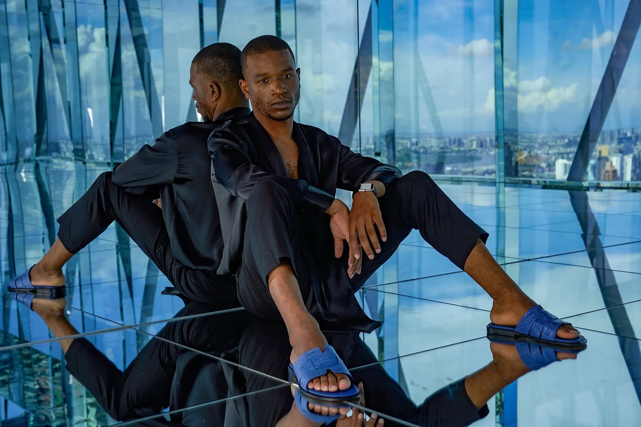 Black silk, reclining on the mirror