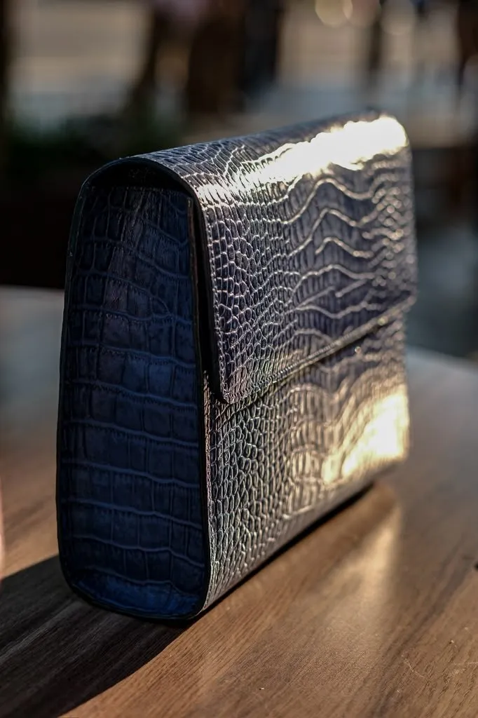 Crocodile leather clutch