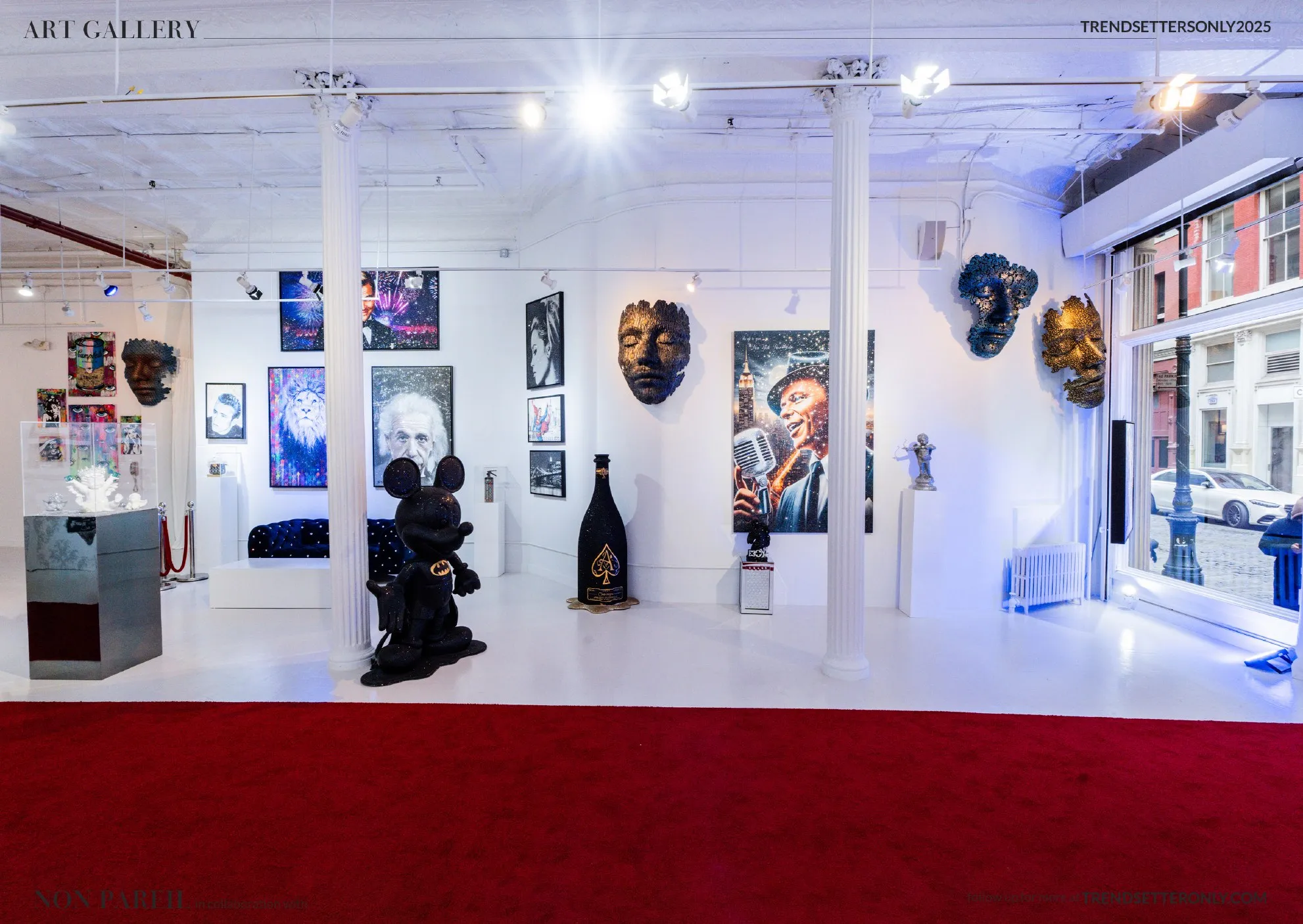Gallery wall with crystal portraits and sculpted masks