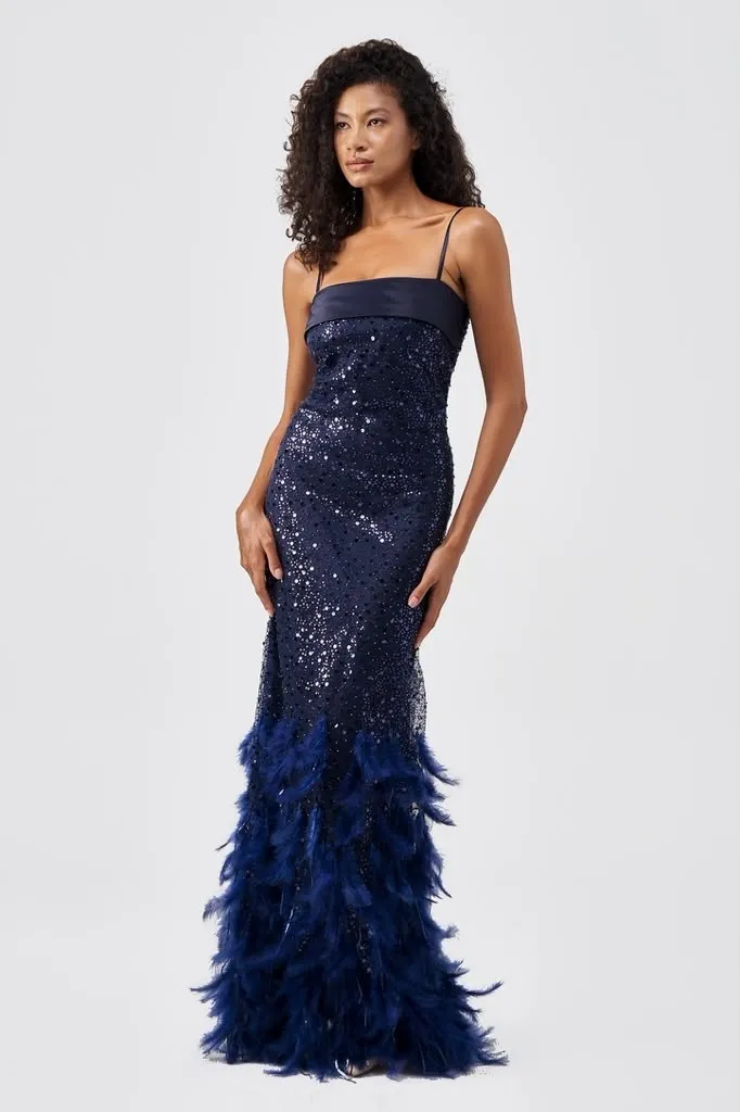 Navy sequin gown with a feathered hem