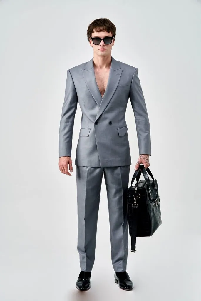 Silver suit with a briefcase