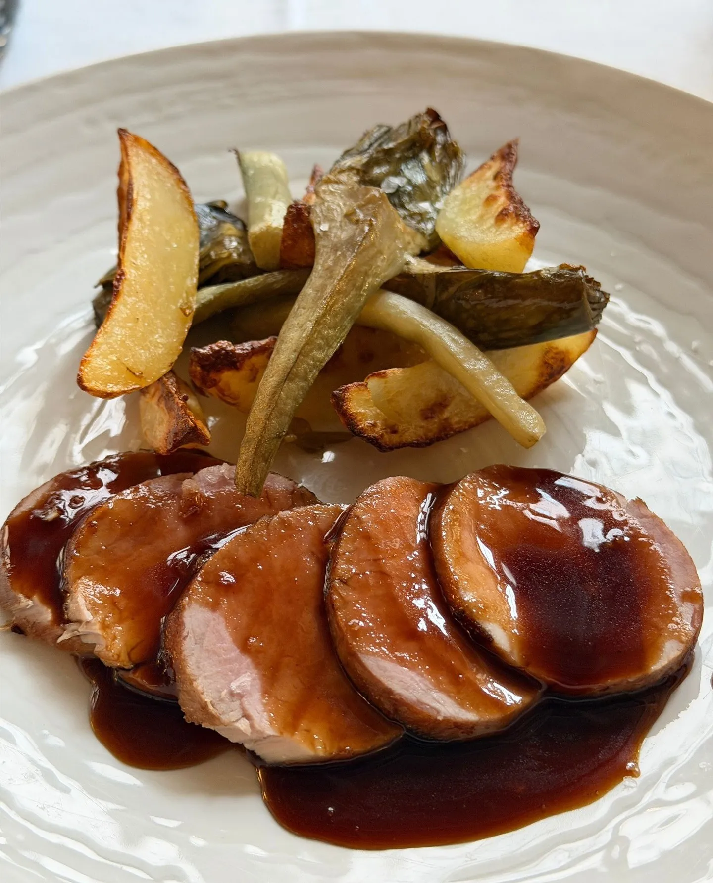 Pork with roasted vegetables and jus