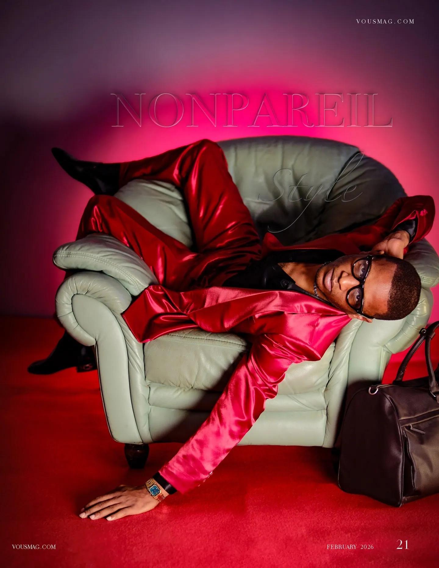 Travon Ridley-Evans in red satin on a white sofa, NONPAREIL